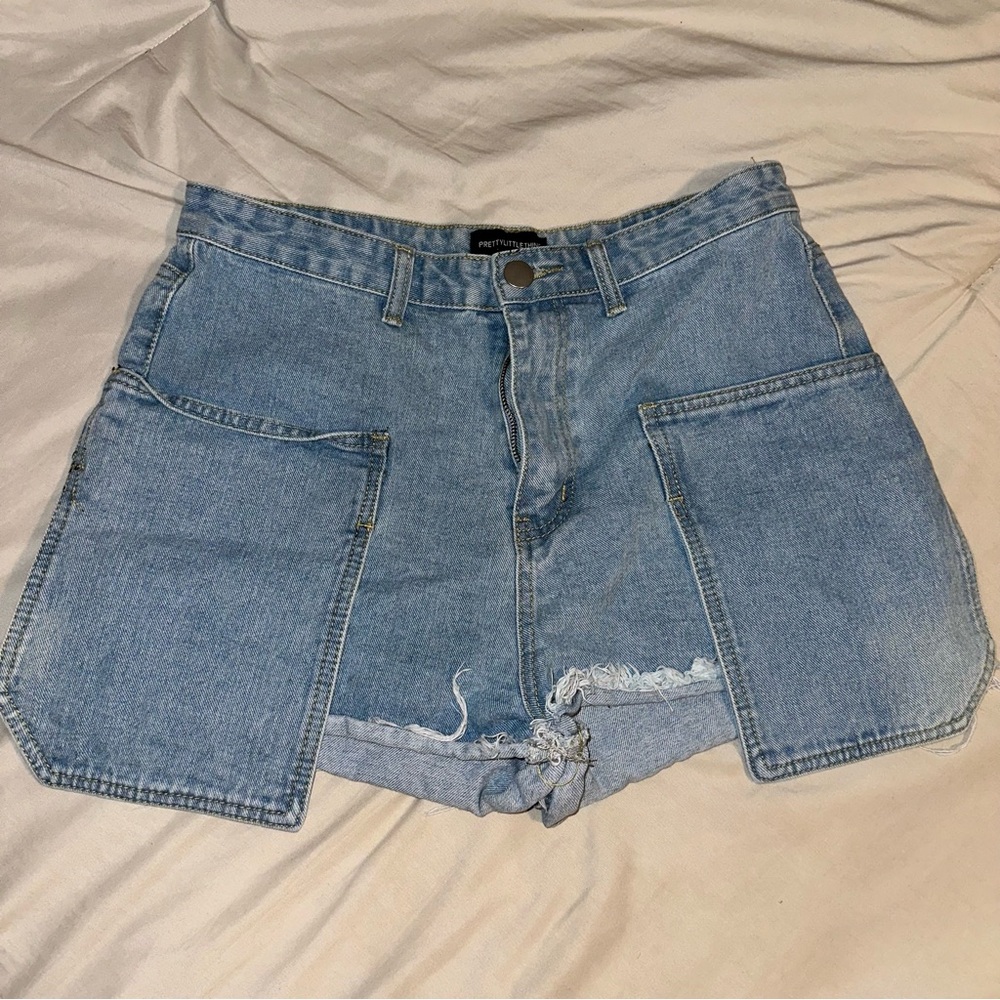 Black Button-Up Shirt and Light Blue Jeans